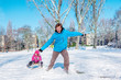 Photo: Father and daughter in a winter park Father and daughter in a winter park