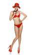 Photo: Smiling woman in full length wearing red bikini and straw hat Smiling woman in full length wearing red bikini and straw hat