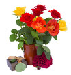 fresh garden roses in clay pot