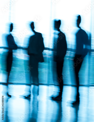 Photo: Blurred businesspeople Blurred businesspeople