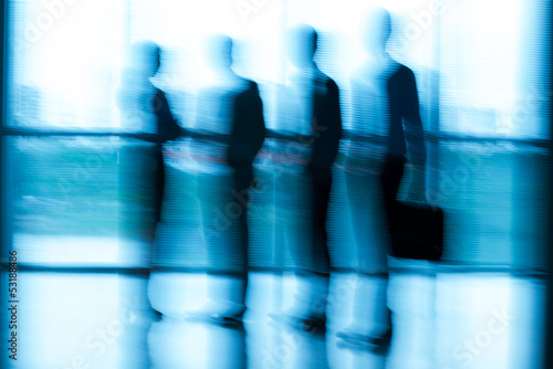 Photo: Blurred people at the office Blurred people at the office