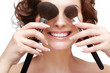 woman with makeup brush