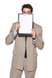 Business man holding blank clipboard in front of his face
