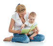mother reading a book to her baby boy