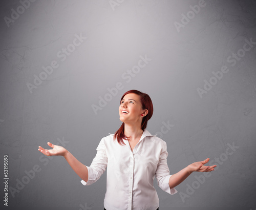 Photo: beautiful young lady juggling with copy space beautiful young lady juggling with copy space