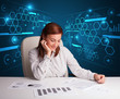 Photo: Businesswoman doing paperwork with futuristic background Businesswoman doing paperwork with futuristic background