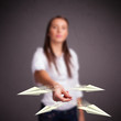 Photo: Beautiful lady throwing origami airplanes Beautiful lady throwing origami airplanes