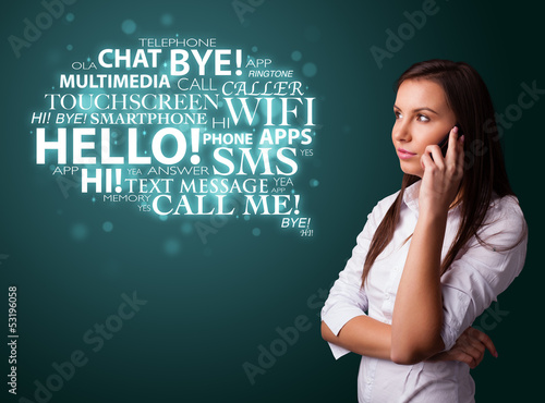 Photo: Young girl calling by phone with word cloud Young girl calling by phone with word cloud