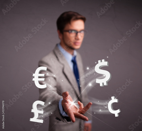 Photo: Attractive man throwing currency icons Attractive man throwing currency icons