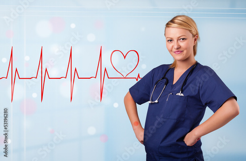 Photo: Young nurse listening to abstract pulse with red heart Young nurse listening to abstract pulse with red heart