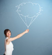 Pretty lady holding a cloud balloon drawing
