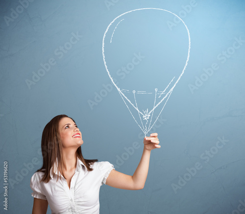 Photo: Beautiful woman holding balloon drawing Beautiful woman holding balloon drawing