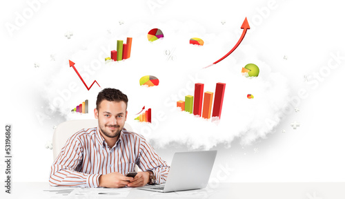 Photo: Handsome businessman with cloud in the background containing col Handsome businessman with cloud in the background containing col