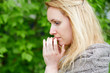 Photo: Portrait of thoughtful woman in grey hand-knitted jacket Portrait of thoughtful woman in grey hand-knitted jacket