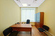 Interior of empty office cabinet with blinds on window