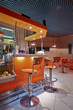 Empty cafe-bar in orange tones