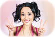 Photo: Retro asian girl gesturing peace love and hope Retro asian girl gesturing peace love and hope