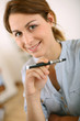 Photo: Portrait of woman smoking with electronic cigarette Portrait of woman smoking with electronic cigarette