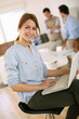 Cheerful Girl In Office Sittin...