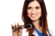 Photo: Doctor giving you a pair of eyeglasses Doctor giving you a pair of eyeglasses