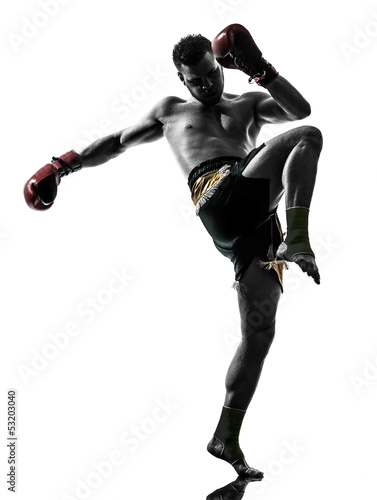 Photo: one man exercising thai boxing silhouette one man exercising thai boxing silhouette