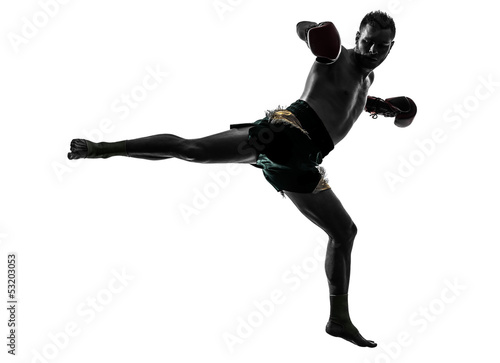 Photo: one man exercising thai boxing silhouette one man exercising thai boxing silhouette