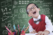 Boy student laughing in class