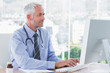 Photo: Doctor typing on his computer Doctor typing on his computer