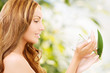 Photo: lovely woman with lily flower lovely woman with lily flower