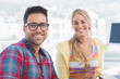 Attractive designers sit in their office