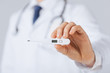 Foto: male doctor with thermometer male doctor with thermometer