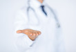 male doctor holding something in his hand