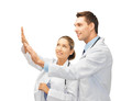 young doctors working with something imaginary