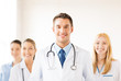 male doctor in front of medical group