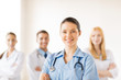 female doctor in front of medical group