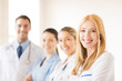 female doctor in front of medical group