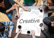 Photo: Creative written on a poster with drawings of charts Creative written on a poster with drawings of charts