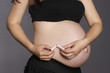 Photo: Pregnant Woman Belly Holding Breaking Cigarette in Half No Smoki Pregnant Woman Belly Holding Breaking Cigarette in Half No Smoki