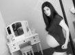 Photo: Beautiful Very Pregnant Woman Shows Belly in Bedroom Monochrome Beautiful Very Pregnant Woman Shows Belly in Bedroom Monochrome