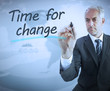 Businessman writing time for change