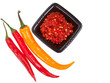 pods of different peppers and spicy sauce