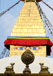 Buddha eyes of Bodhnath stupa and wheel of Dharma with two deers