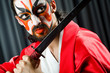 Man with sword and face mask
