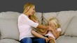 Mother having fun with her daughter in slow motion
