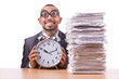 Woman businesswoman with giant alarm clock