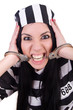 Prisoner in striped uniform on white