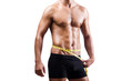 Muscular man measuring his muscles