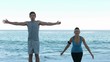 Friends training on the beach
