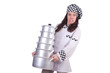 Cook with stack of pots on white