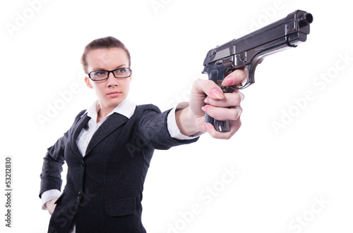 Photo: Woman with gun isolated on white Woman with gun isolated on white